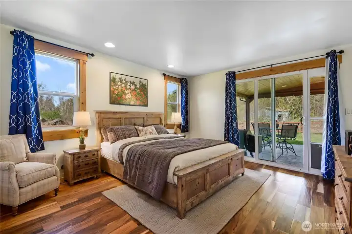 Virtually Staged Primary Owners suite with slider out to covered patio