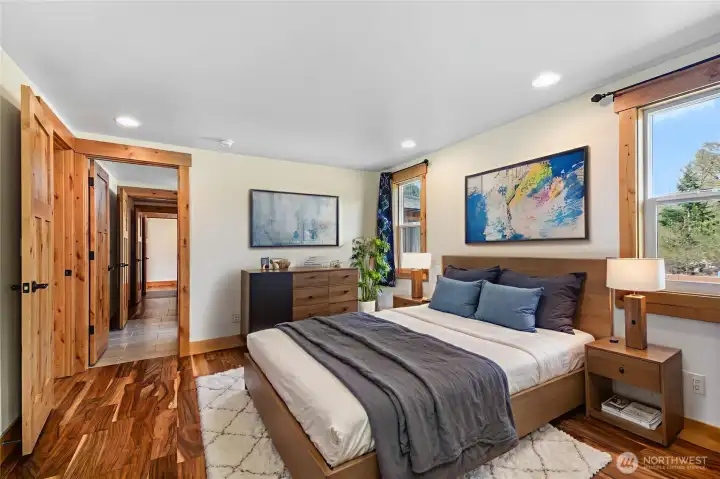 Virtually Staged Primary owners suite with impressive walk-in shower and closet