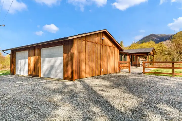 2 car over sized garage with new doors and openers