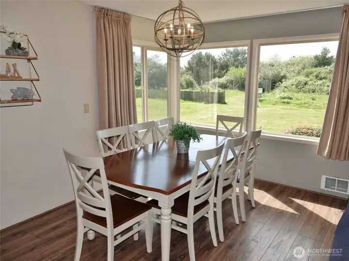 Dining Area w/ large windows for natural light and views of the Dunes and the hotel's backyard.