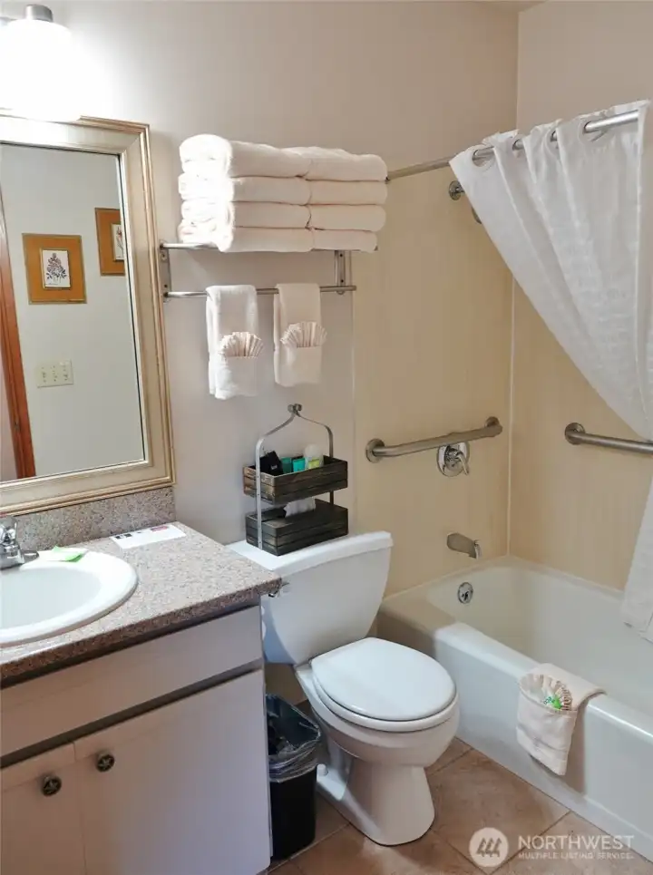 Full Bathroom w/ tile floors.