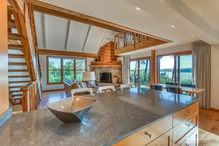 Vaulted ceilings, Oregon Myrtlewood custom trim and accents enhance the  warmth and charm of this island home.