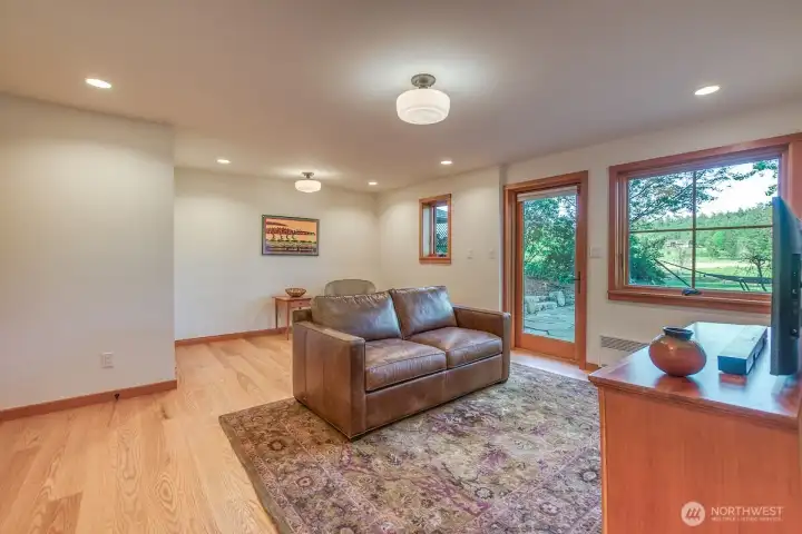 Bonus room adjacent to downstairs bedroom and family room with doors to private bluestone patio with views of Turtleback Mountain.
