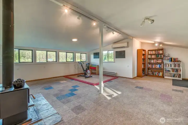 Perfect office, workout room or extra storage space with exterior entry door and through the two-car garage.