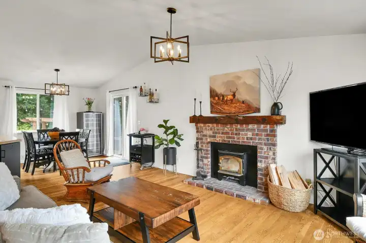 Cozy up in front of the wood burning fireplace on a cool evening.