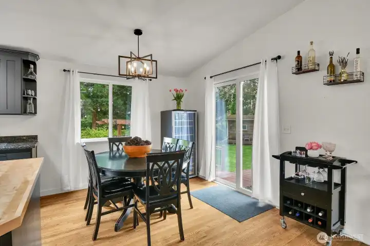 Easy main-level access to the deck, opening to a spacious, level backyard—perfect for everyday living and entertaining.