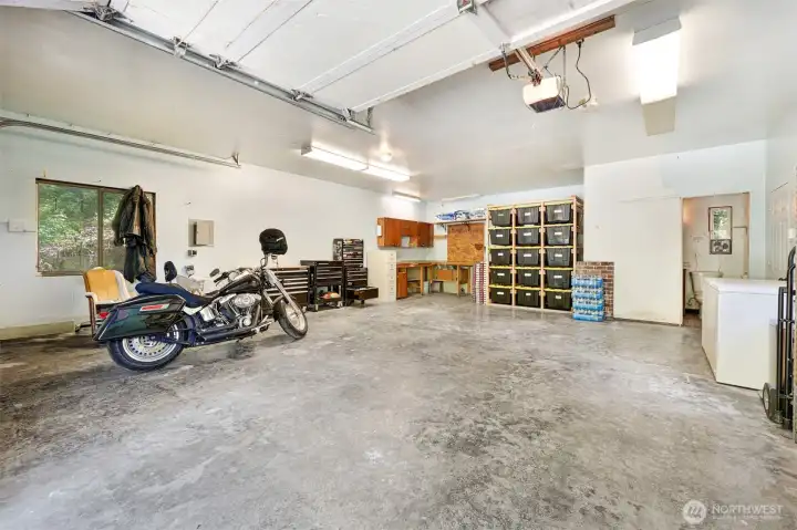 Garage is insulated & heated - and set up for a galley kitchen & laundry for pontential back yard cottage conversion