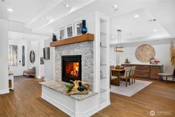 Living area with gas fireplace and open floor plan designed for easy single-level condominium living.