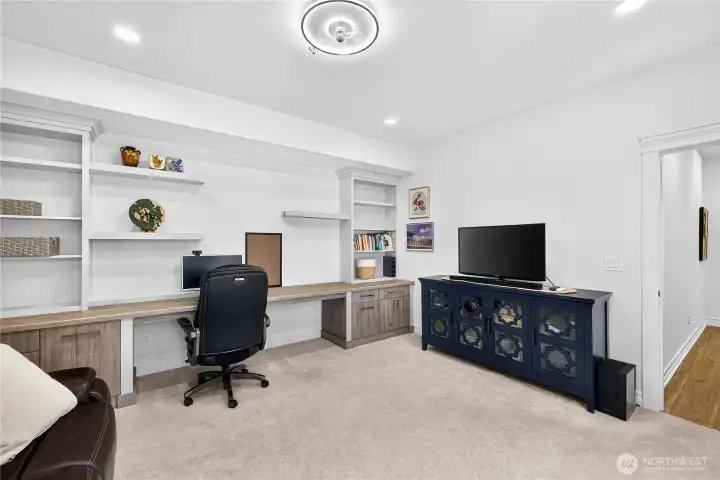Dedicated home office with custom workspace, built-in storage, and flexibility for remote work, hobbies, or creative pursuits.