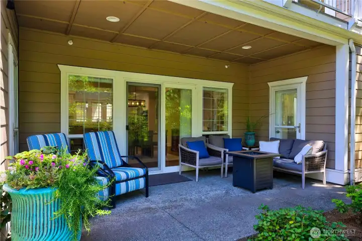 Covered outdoor patio overlooking the greenbelt, providing a private setting for relaxing, entertaining, and year-round enjoyment.