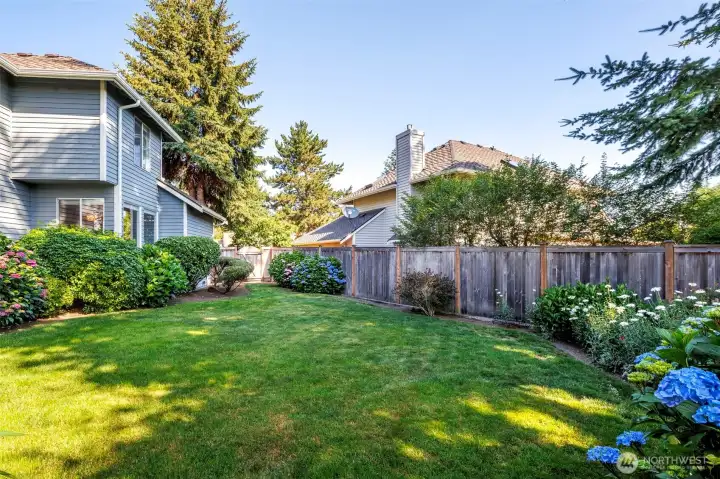 Lots of room to play and garden; gates on both sides of backyard Lots of room to play and garden; gates on both sides of backyard