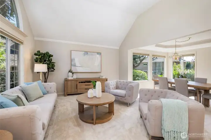 Spacious living room flows in to window-filled dining room Spacious living room flows in to window-filled dining room