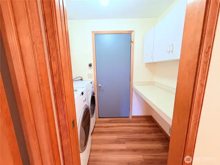 Laundry Area with Cabinets-Entrance to Garage