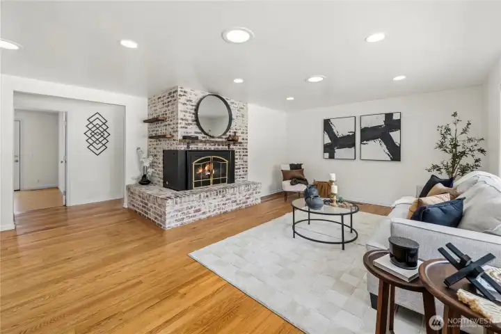 Enter to your light filled living room with a gas fireplace! Enter to your light filled living room with a gas fireplace!