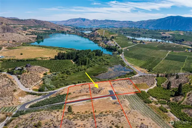 Come live the quintessential Manson life tucked away above Wapato Lake. Lot lines are approximate