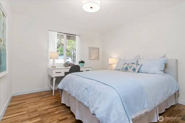 Roomy secondary bedroom offering pleasant park views