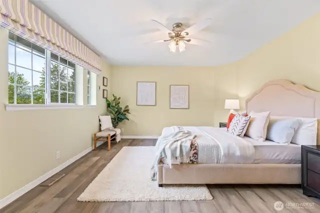 Large Primary bedroom has beautiful view of the mountains