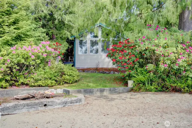Lake Cavanaugh cabin in the woods with one of the best sandy beaches on the lake.