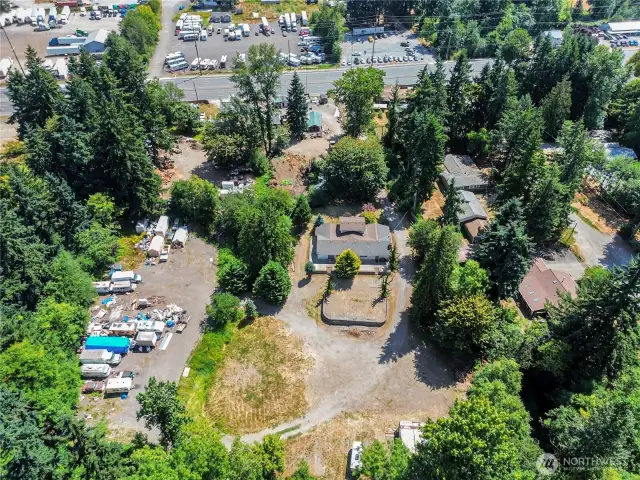 Full 2.5 acres is perfectly square, with home in approx. middle, and front driveway off Canyon on the side.