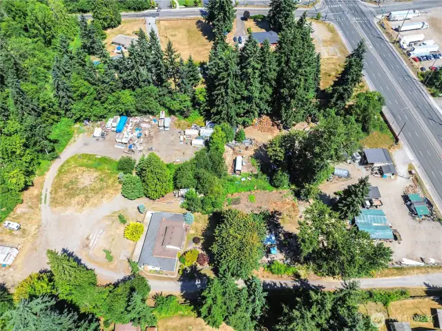 Long front driveway access has an iron gate towards the front & a 2nd iron gate towards the end of the driveway for added security if need be.  Large circular drive for easy turnaround of work trucks.  All vehicles & items on site will be removed prior to close.