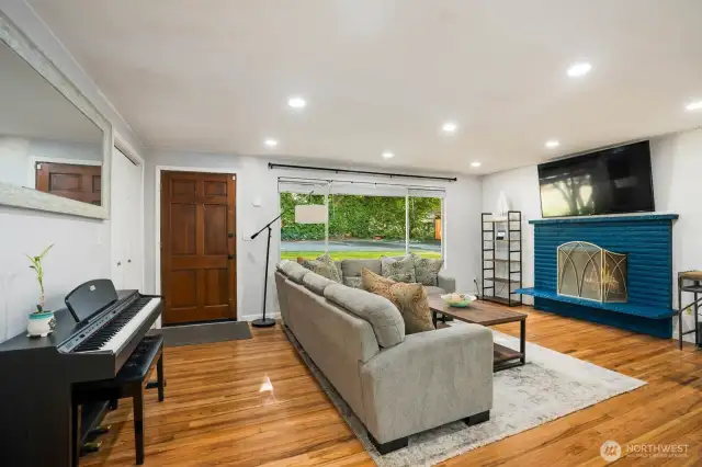 Recessed lighting & a huge picture window make for a light & bright space!