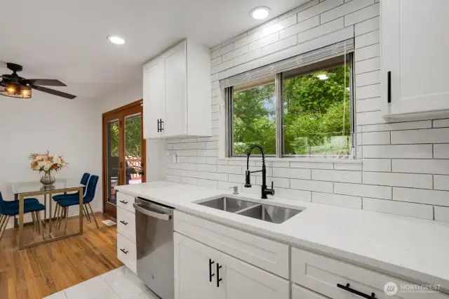 All new countertops, tile, fixtures & appliances!