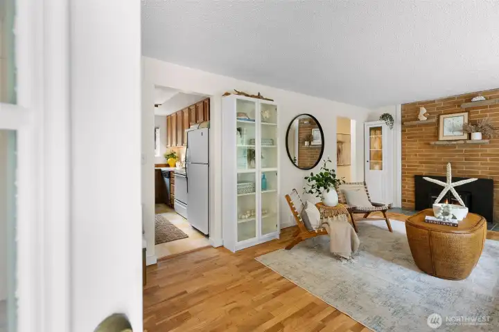 Open living room filled with natural light.