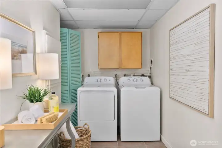 Spacious laundry room located on the lower level.