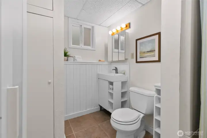 Lower level includes a bathroom with shower and all the essentials for comfortable living.