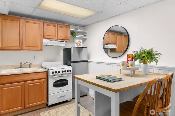 Lower level features a full kitchen—ideal for rental, multi-generational living, or guest space.