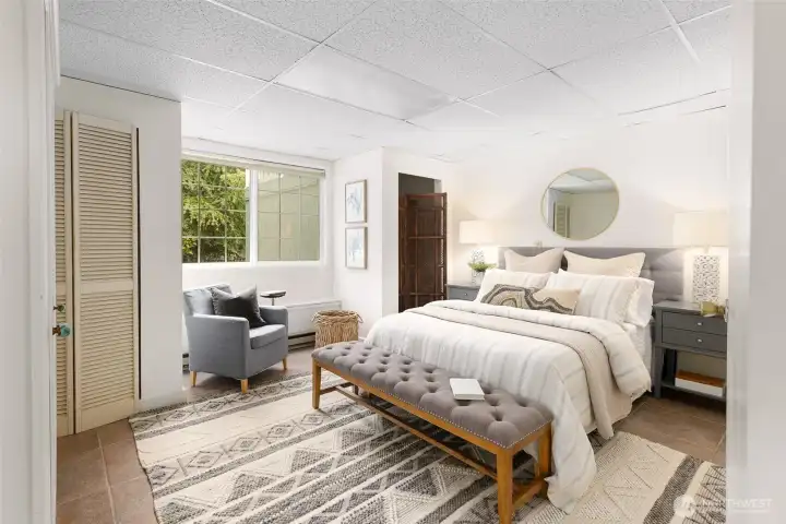 Versatile lower level with potential for office, guest room, or creative studio.