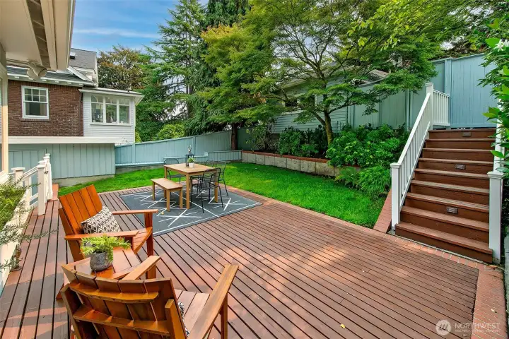 Easy access to the level backyard ~ fully fenced and the stairs lead you to the alley and garage.