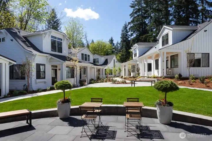 View from the Community Clubhouse overlooking white cottages.