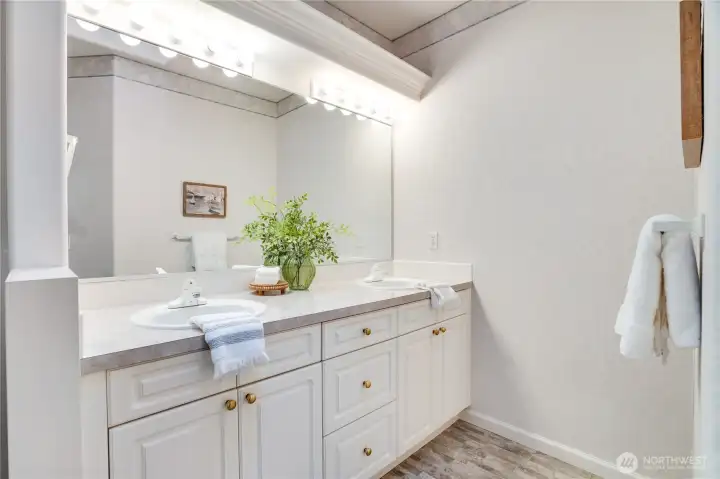 Dual vanity in primary bathroom.