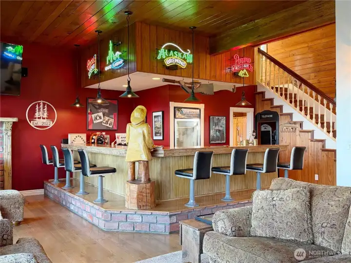 Huge custom bar with neon beer signs
