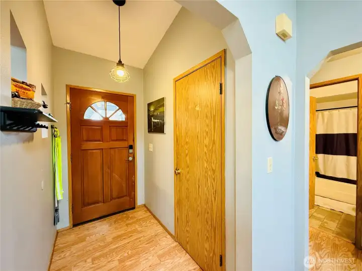 Entryway, home has lots of storage, character peekaboo cutouts to dining area, LVP, single level split bedroom layout for privacy