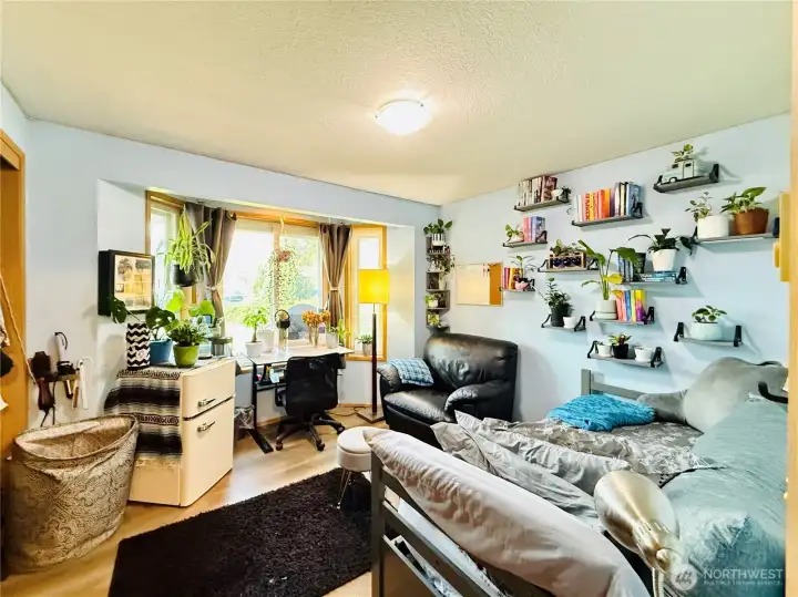 Front bedroom with bay windows, LVP flooring