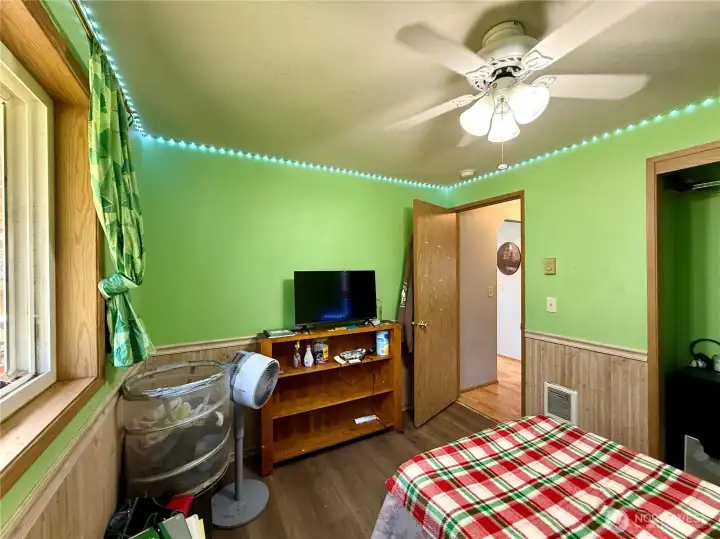 Back bedroom, Lvp flooring, bathroom next door, views to the fully fenced backyard