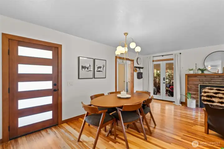 Beautiful dinning area welcomes you home with the gorgeous original hardwood  floors open to living space.