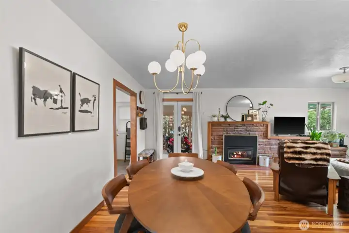 The open feel with the dining area flowing into the living room and just off the kitchen makes for a great space to host that dinner party.