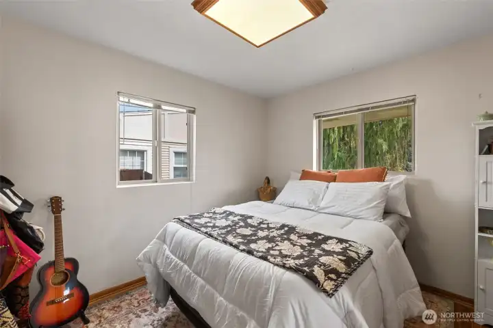 This second bedrooms provides ample space for everything you need with amazing lighting and large closet.