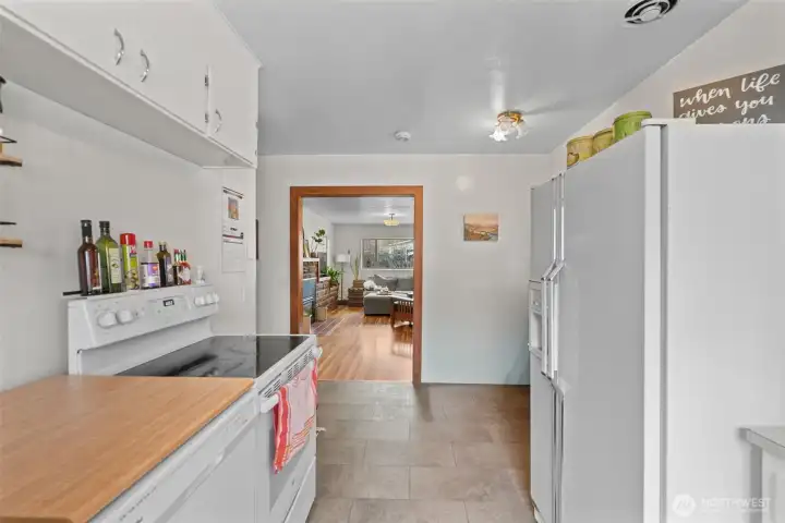 The kitchen has that cozy feel of being separated from the entertaining area but still a part of everything going on.