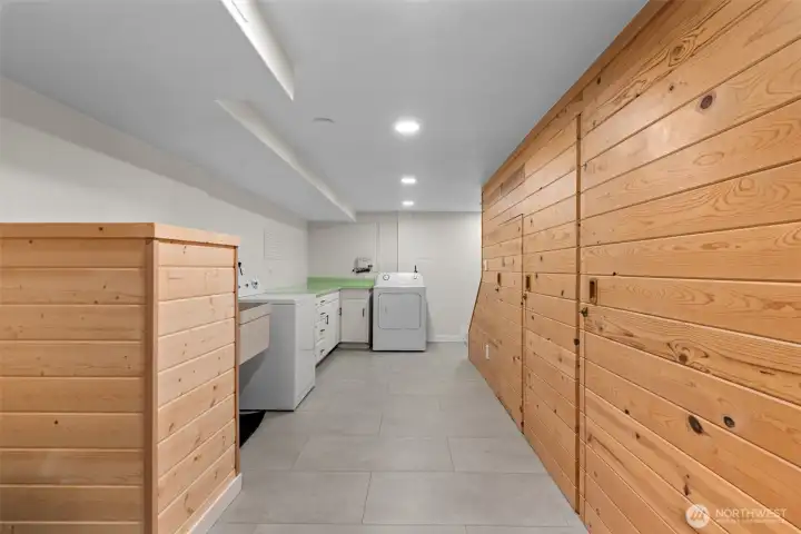 laundry space with storage and countertop space.