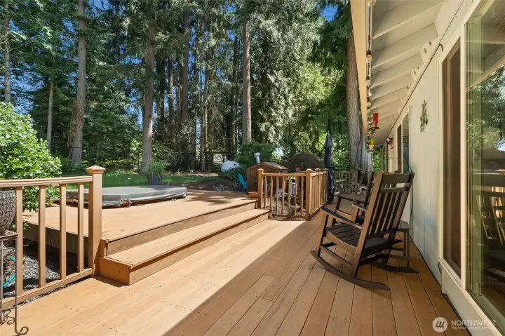 Relaxing hot tub and serene wooded surroundings, creating your private backyard retreat. Fully fenced. Relaxing hot tub and serene wooded surroundings, creating your private backyard retreat. Fully fenced.