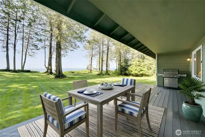 A covered Trex deck allows for year-round enjoyment of this spectacular view