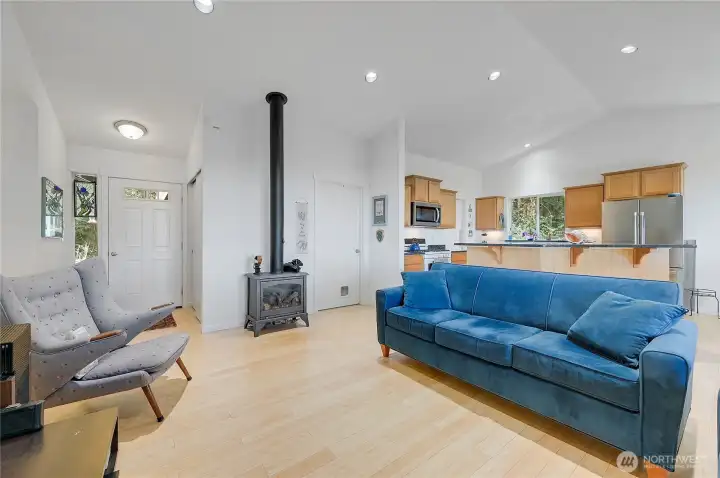 Looking towards the entry. The door next to the fireplace goes to the laundry room and garage.