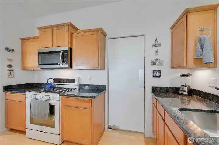 The door opens into a spacious pantry.