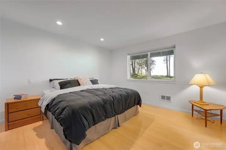 The primary bedroom offers a stunning view.