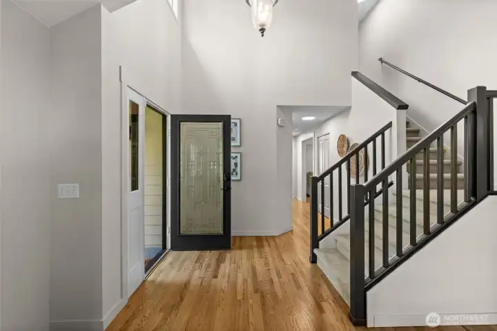 Light-filled and beautifully proportioned, the welcoming foyer introduces the home's airy, open-concept design. Light-filled and beautifully proportioned, the welcoming foyer introduces the home's airy, open-concept design.