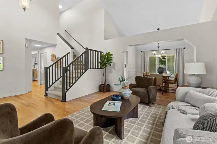 Cozy right up with a gorgeous formal living room setting, framed by soaring ceilings and stunning windows. Cozy right up with a gorgeous formal living room setting, framed by soaring ceilings and stunning windows.